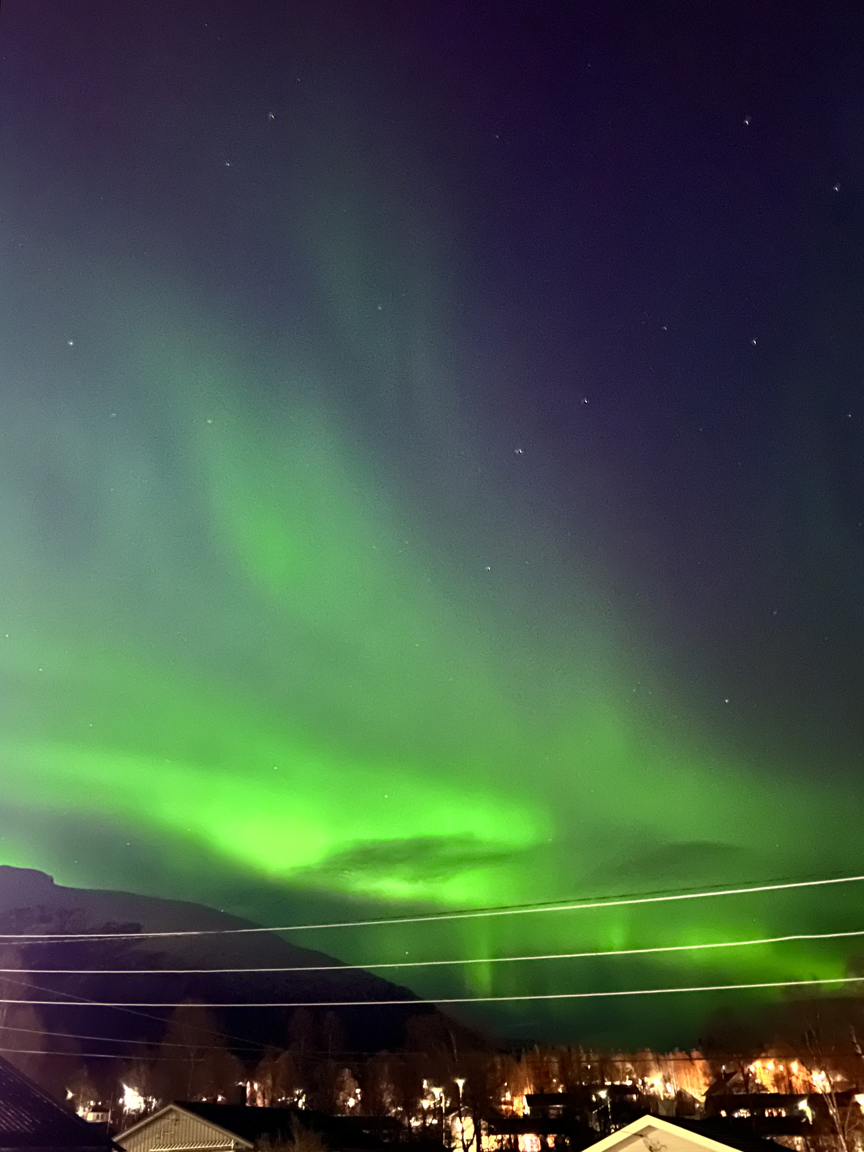 Northern lights over small village